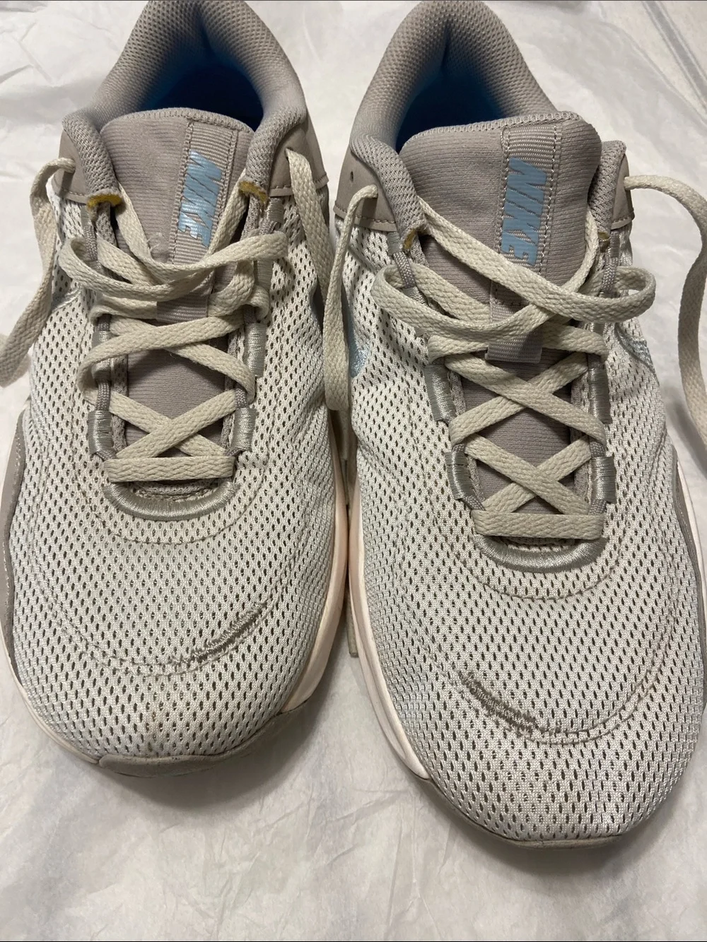 Nike women’s Light tan Mesh Sneaker with Subtle Silver Swoosh